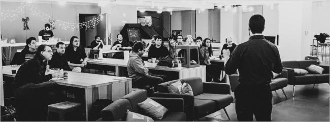A group of people attending a Boston Ruby meetup.
